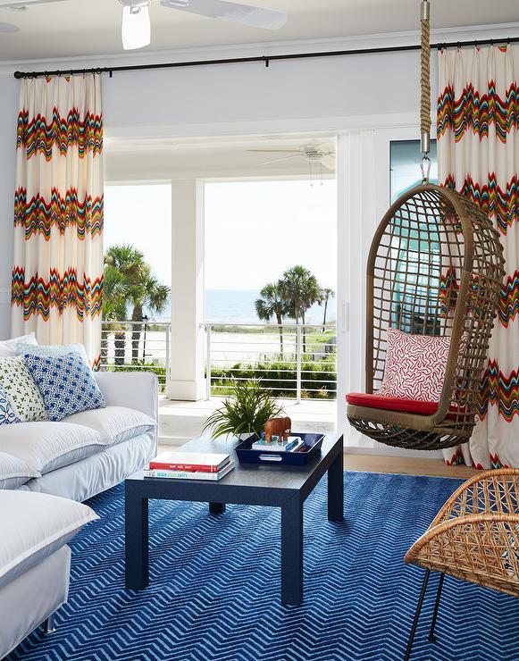 White and Blue living Room with Rope Hanging Chair - Transitional