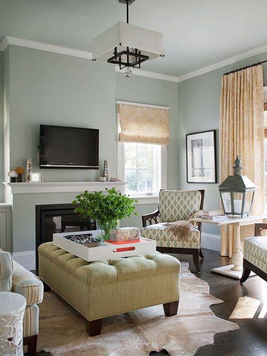 Comfy, Yet Chic:: The small living room at the front of the house functions  as a grown-up space for entertaining. The colors here mimic those used in  the