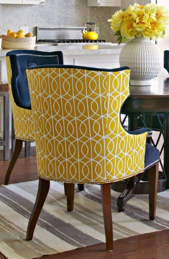 chairs upholstered in two different fabrics can have real pop