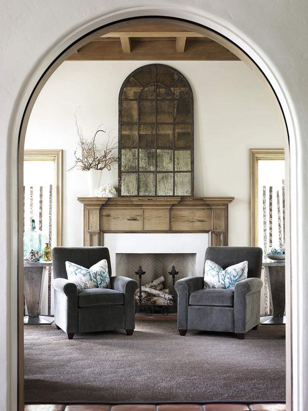 Entrance-Seating-by-Carter-Kay-Interiors How to decorate a fireplace mantel (neat decoration ideas)