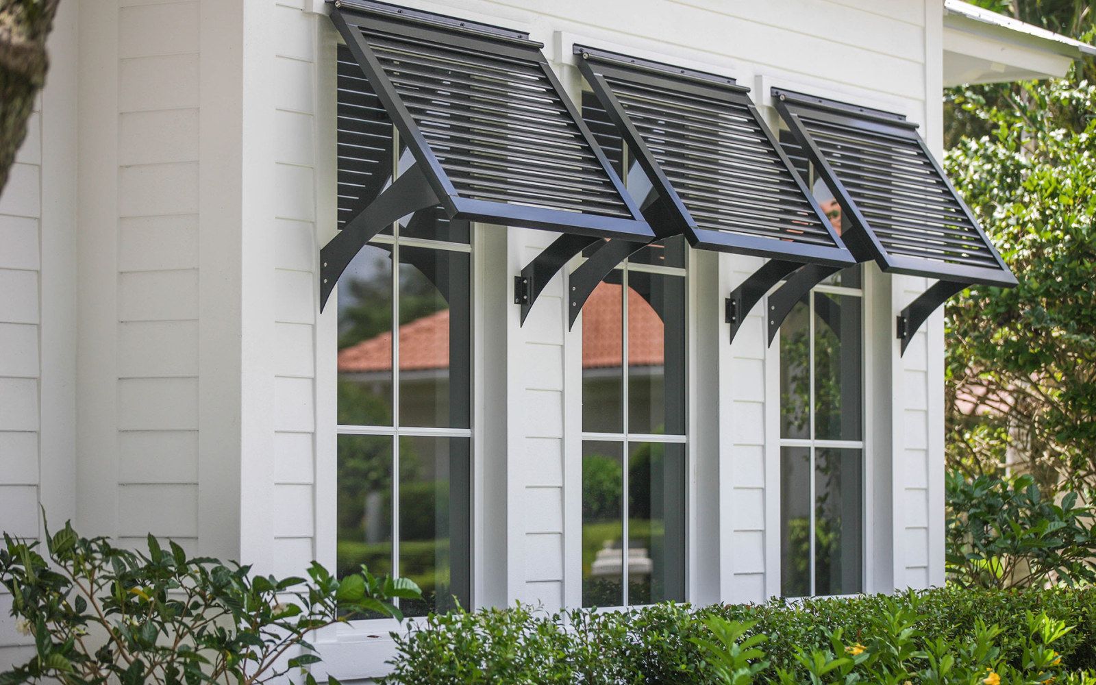 What are Bahamian shutters and what are
their advantages and disadvantages?