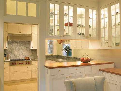 How to Utilize Glass-Front Cabinets in Your Kitch