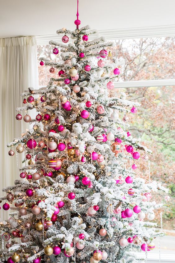 bold fuchsia and gold ornaments for a flocked tree