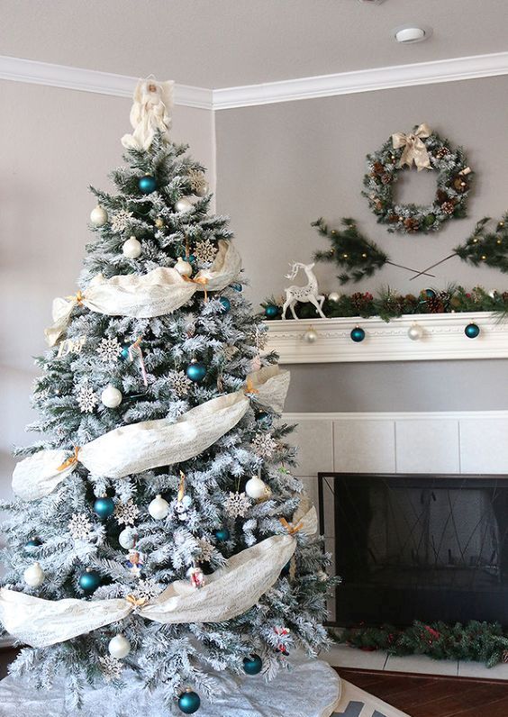 emerald and white ornaments and fabric garlands look eye-catching