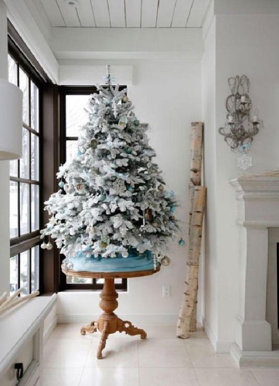 icy blue and gold ornaments for decorating a tree