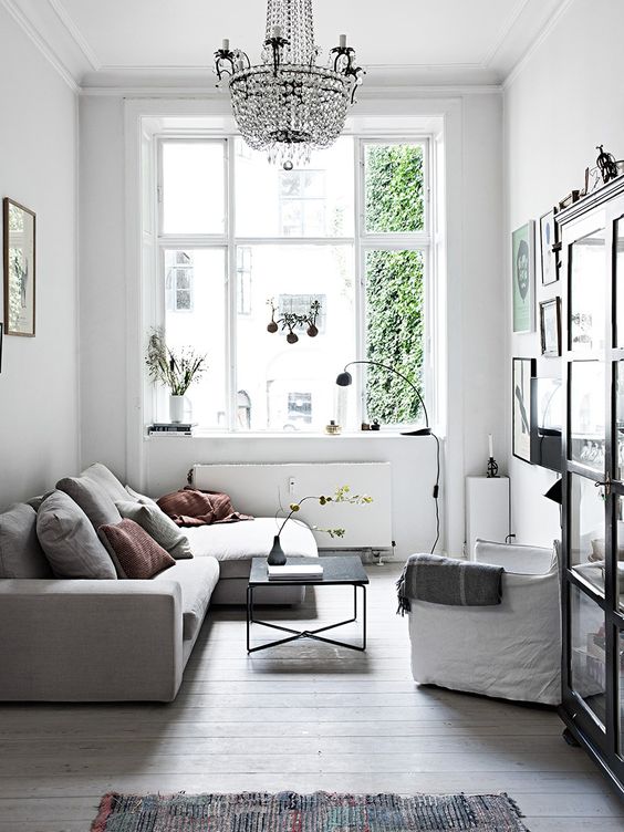 Scandinavian inspired living room in light gray and white