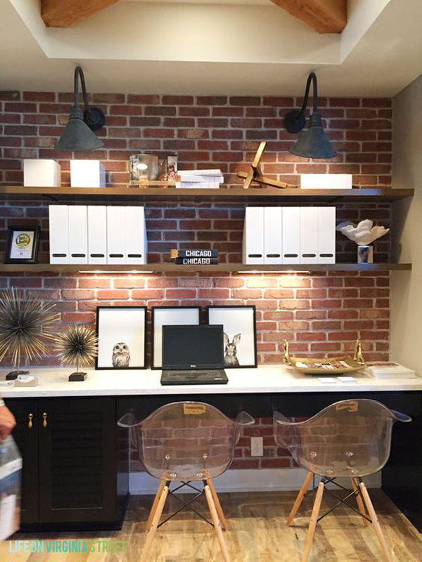 modern shared home office with brick wall