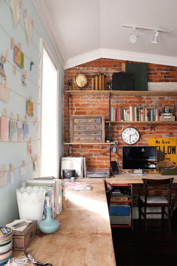 Rustic modern home office design with brick walls
