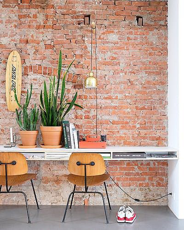 minimalist home office with brick walls