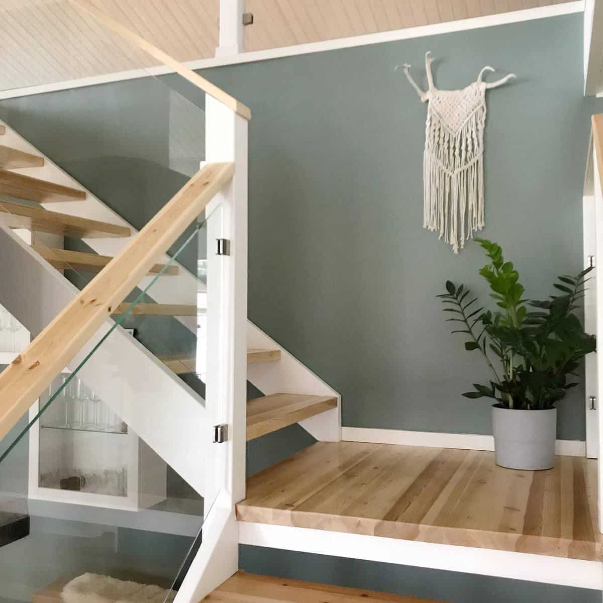 Simple wooden stairs in boho house