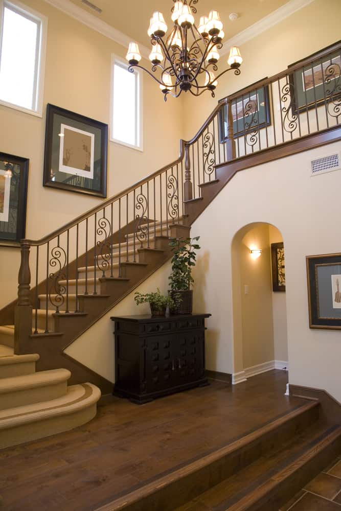 Elegant staircase with decorated railing 