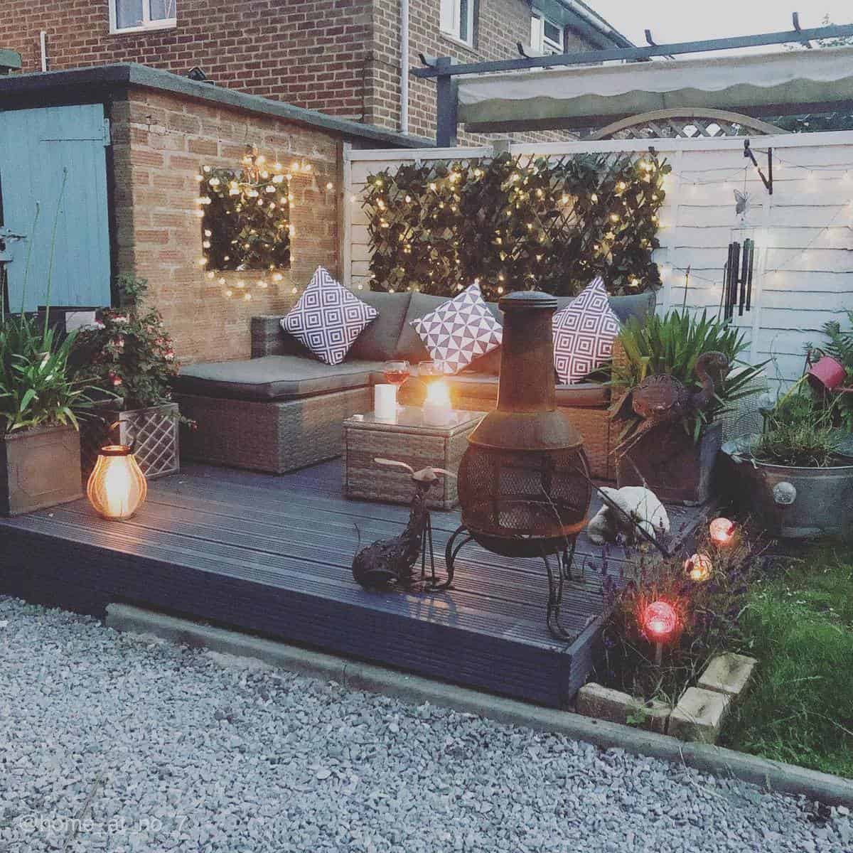 Small wooden terrace with fairy lights