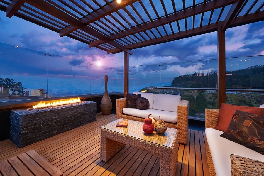 modern terrace with fireplace and sea views