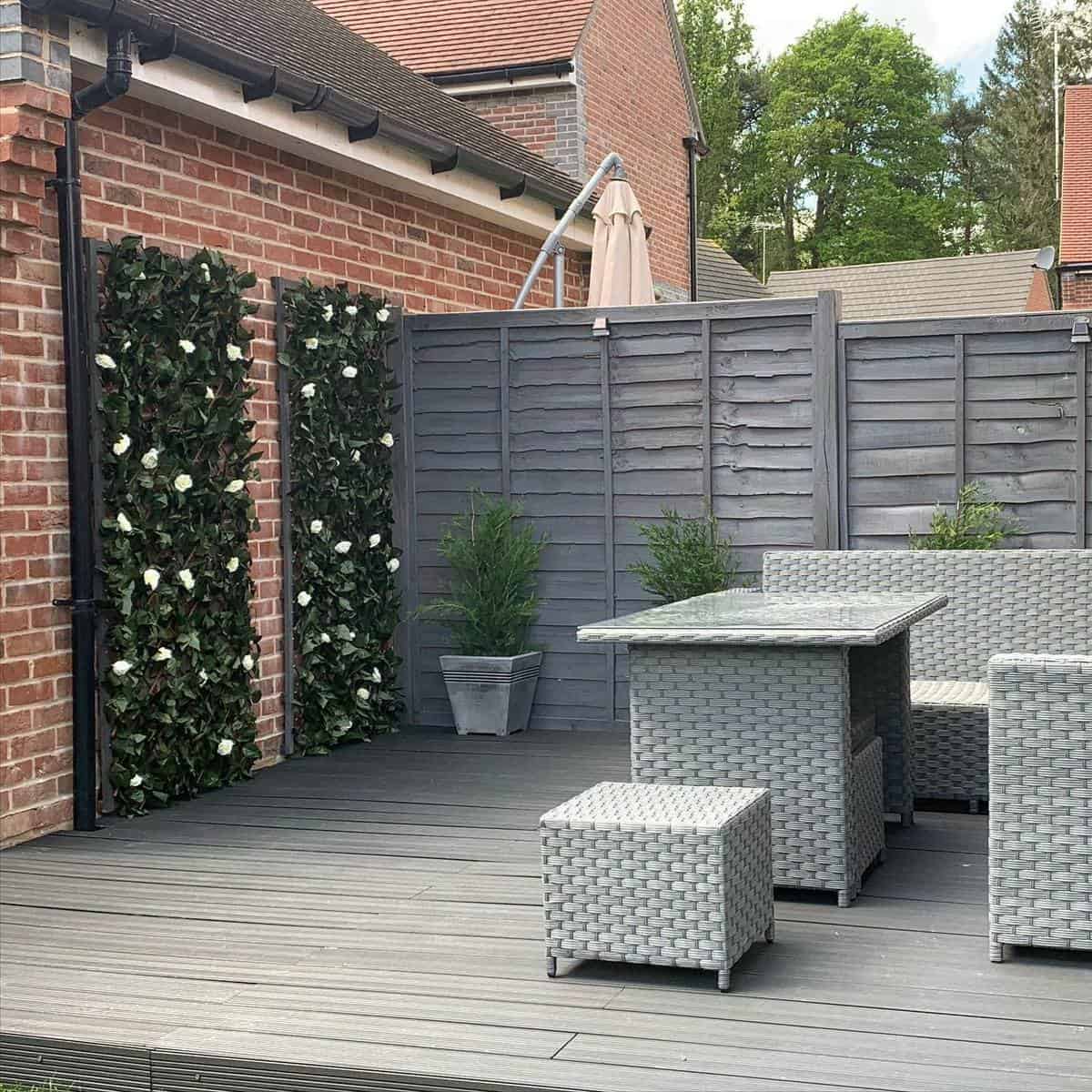 Gray deck, gray vertical planter box for garden furniture 