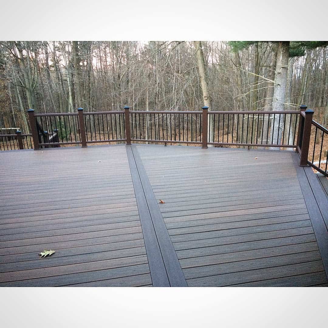 Large empty wooden deck railing 