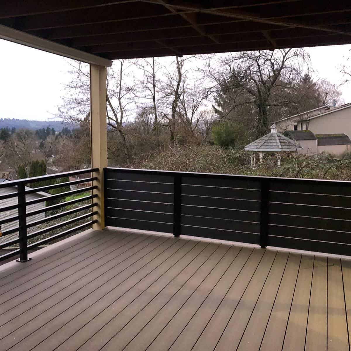 Simple empty wooden deck with railing