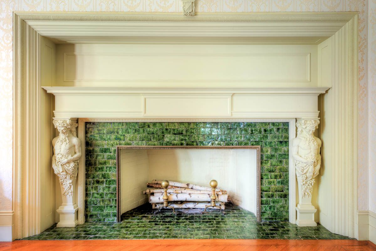 Green tiles for the fireplace design