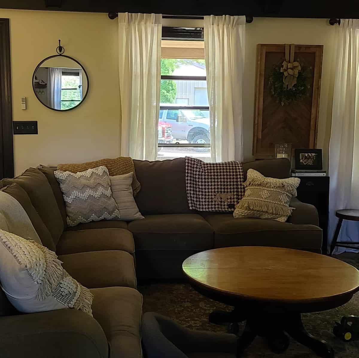 small living room, brown wooden table, gray couch