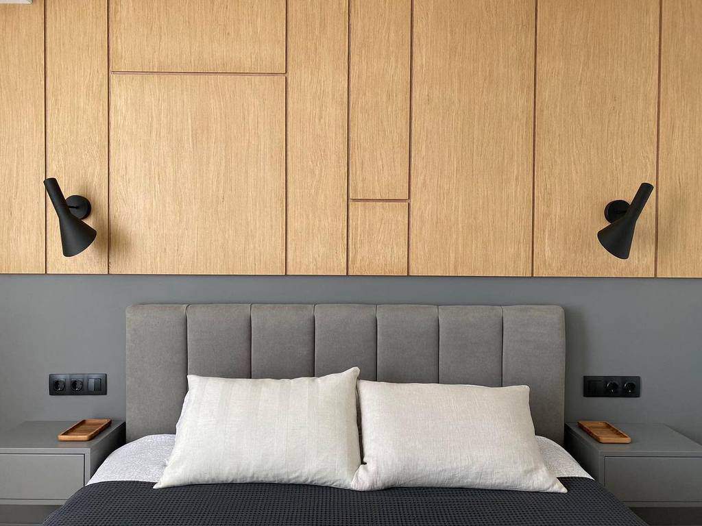 Modern bedroom with wood paneling 