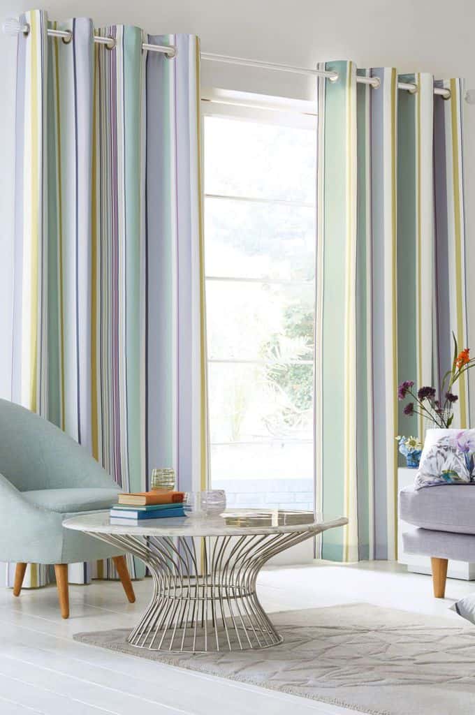 Curtains in the living room with a pastel pattern 