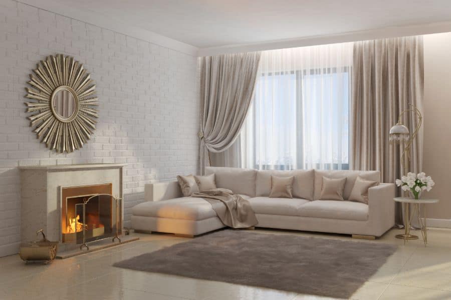 neutral living room fireplace and sofa 