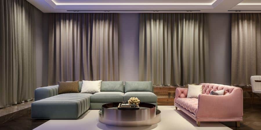 large luxury living room with pink and gray sofas