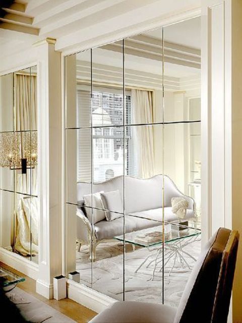 Whole wall mirrors to maximize light and space
