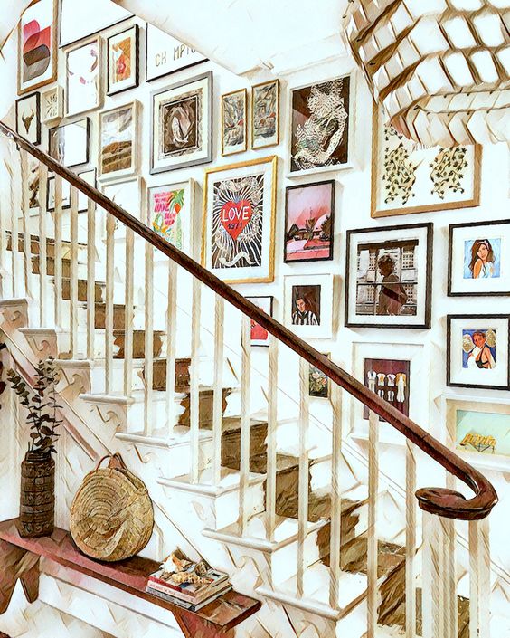 A sophisticated gallery wall with lots of art and photos and mismatched frames is a fantastic idea for an eye-catching entryway