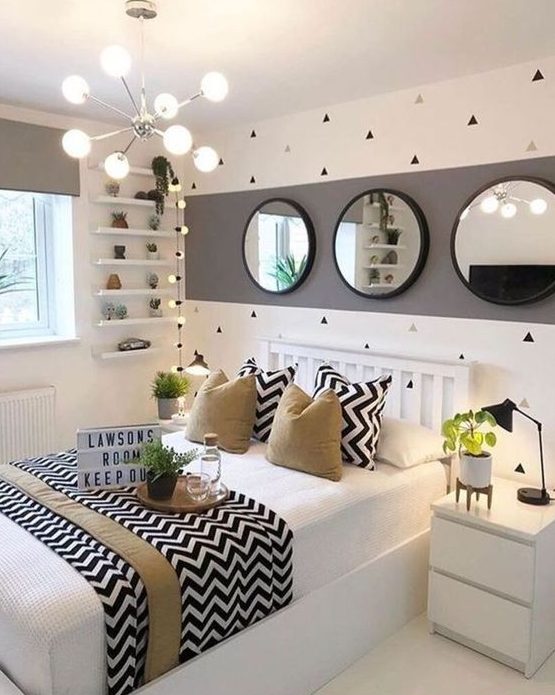 A stylish and playful teenage girl's bedroom in white, gray and black with brown accents, geometric prints and greenery