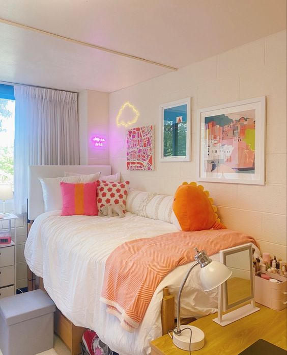 An eye-catching teen room with a bed, an eye-catching neon gallery wall, a vanity and some other simple furniture