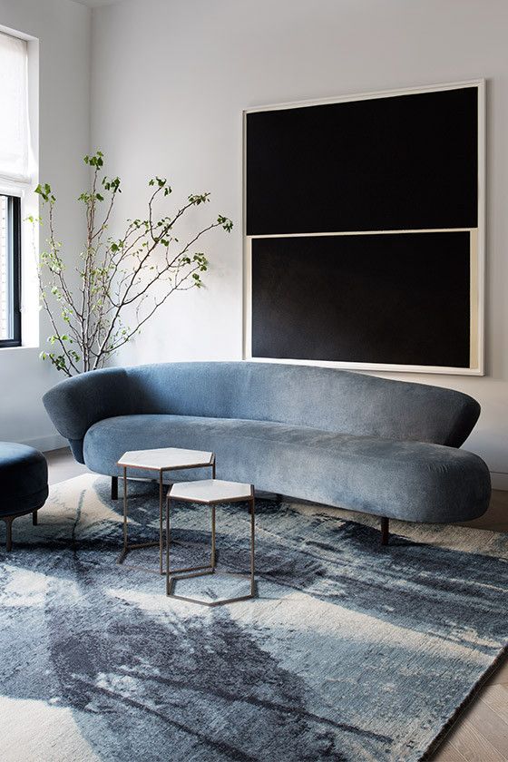 Even if your sofa is not curved but has a curved back, it brings out cool lines and silhouettes and looks stunning