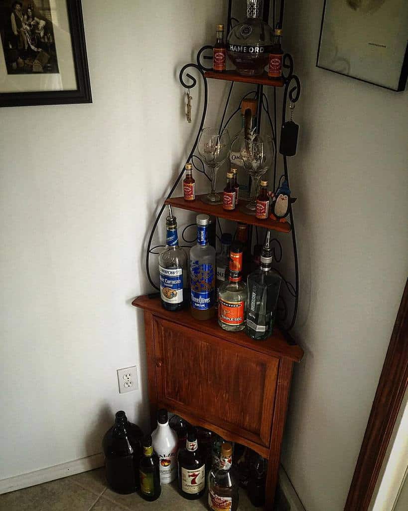 Rustic corner liquor cabinet