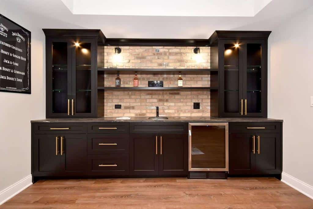 Large wall-mounted liquor cabinet with brick backsplash 