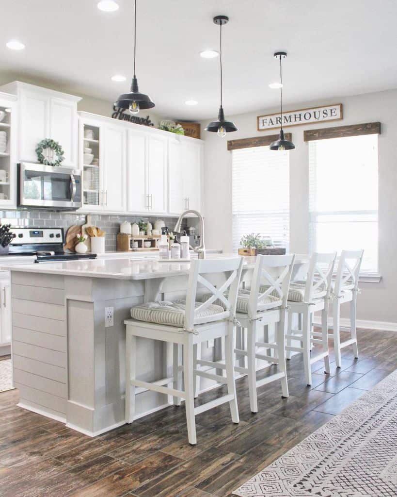 White rustic farmhouse kitchen with wood vinyl flooring