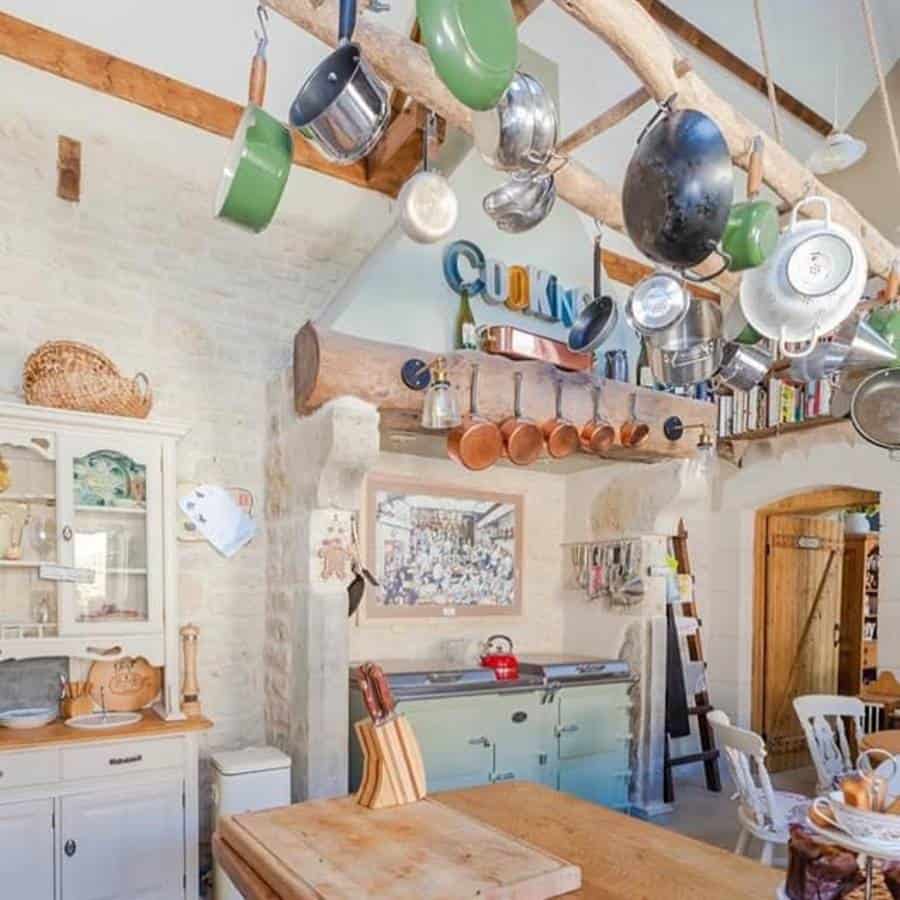 Country style kitchen bench for hanging wooden pots and pans from the ceiling 