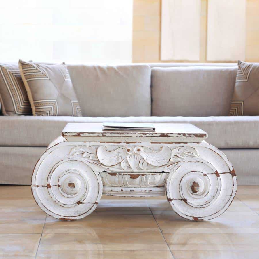 Vintage white table, gray couch 