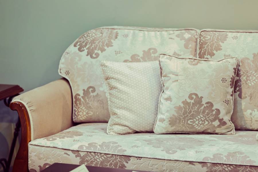 Sofa with vintage pattern and pillows