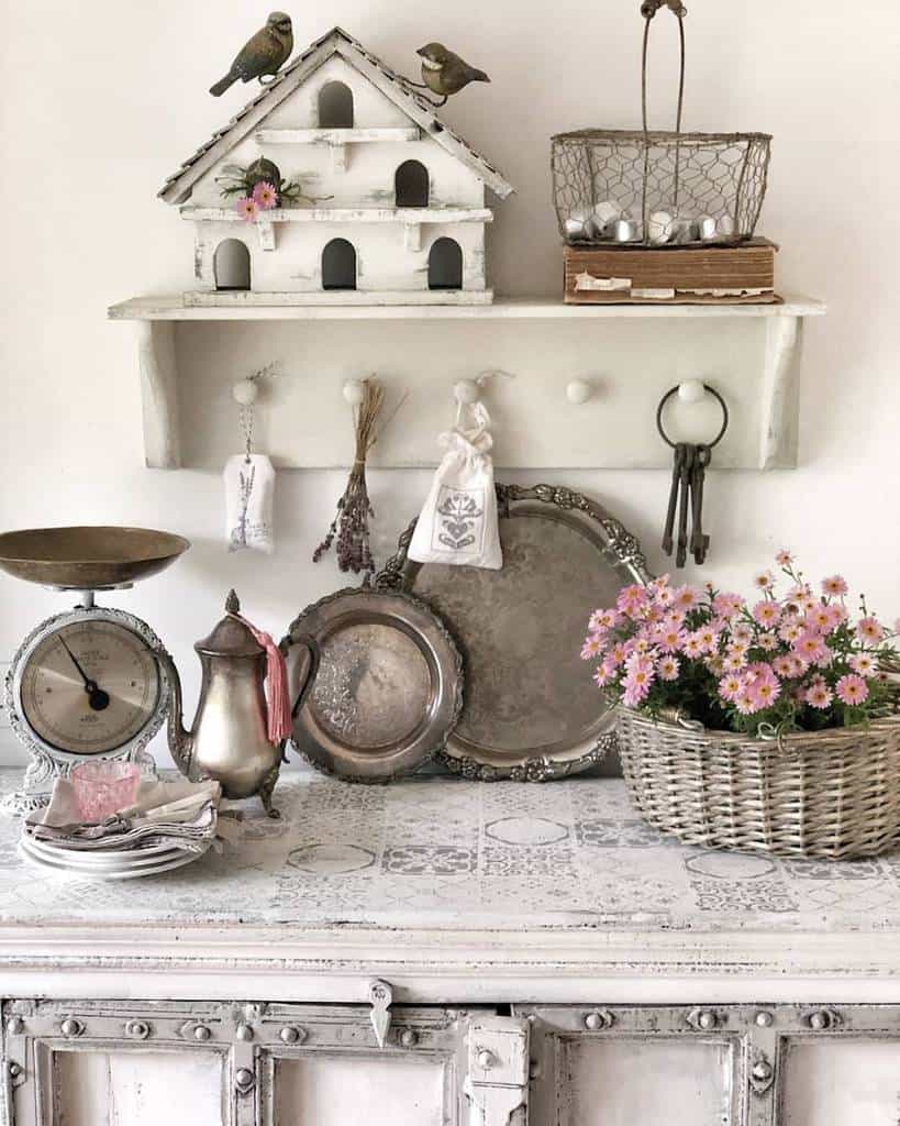 French kitchen decor, wooden wall, key hanger, birdhouse, silver plates and teapot scales 