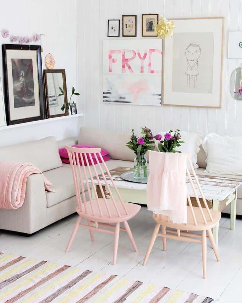 cute living room with pink chairs