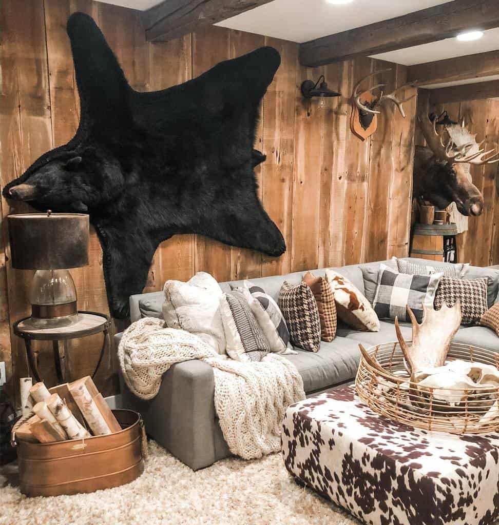Wooden living room with animal trophies 