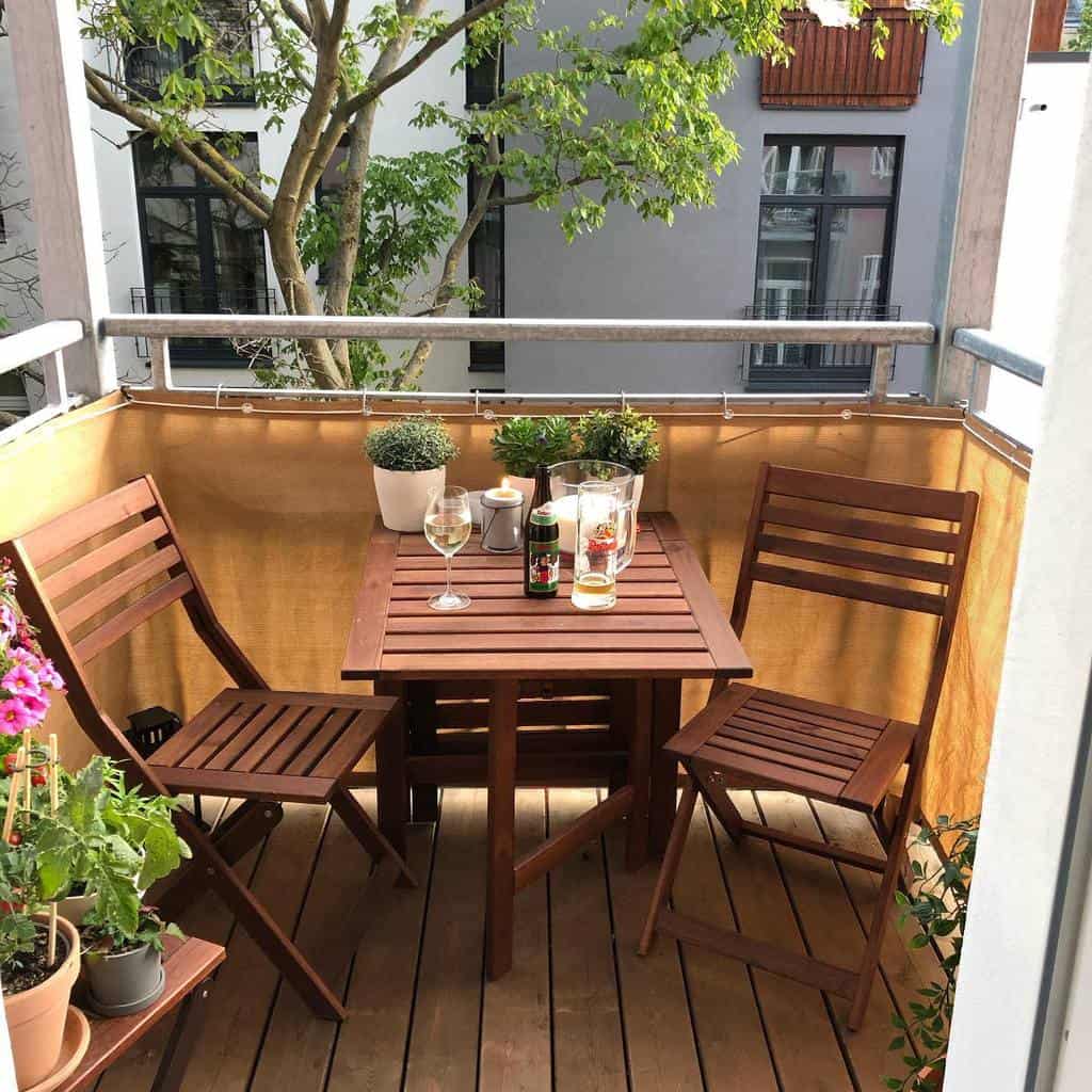 small terrace with wooden furniture