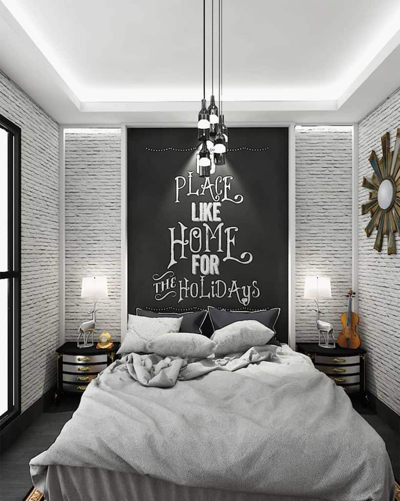 Small modern bedroom with chalkboard accent wall