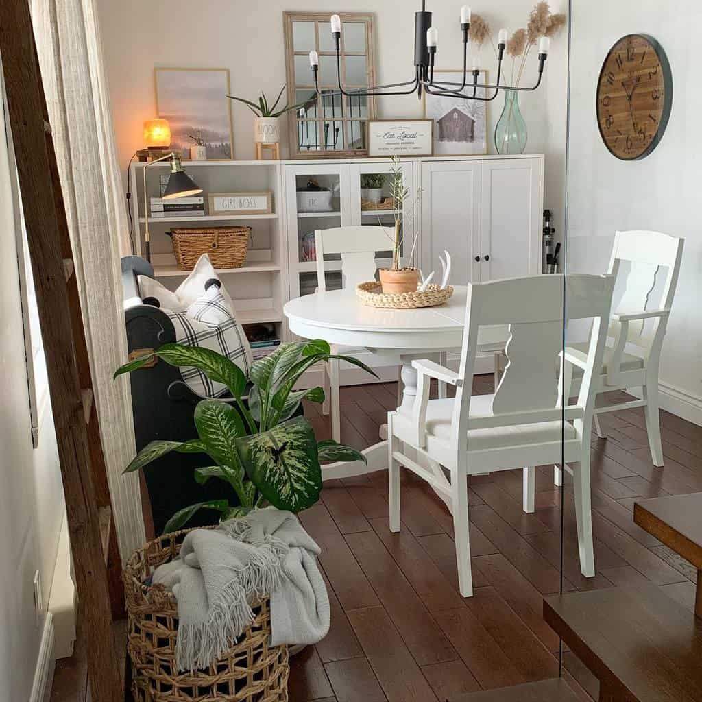 small dining room, white table and chairs, white cabinet, Sputnik chandelier