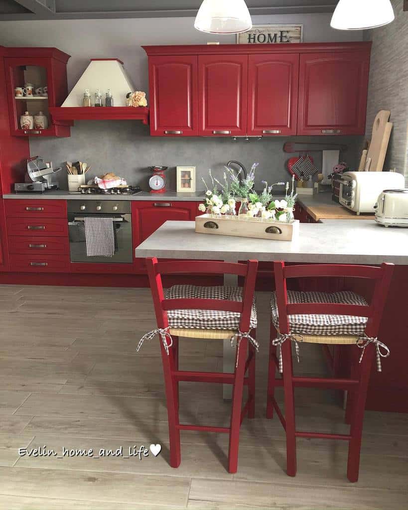 Red kitchen cabinet, marble bar, wooden floor 