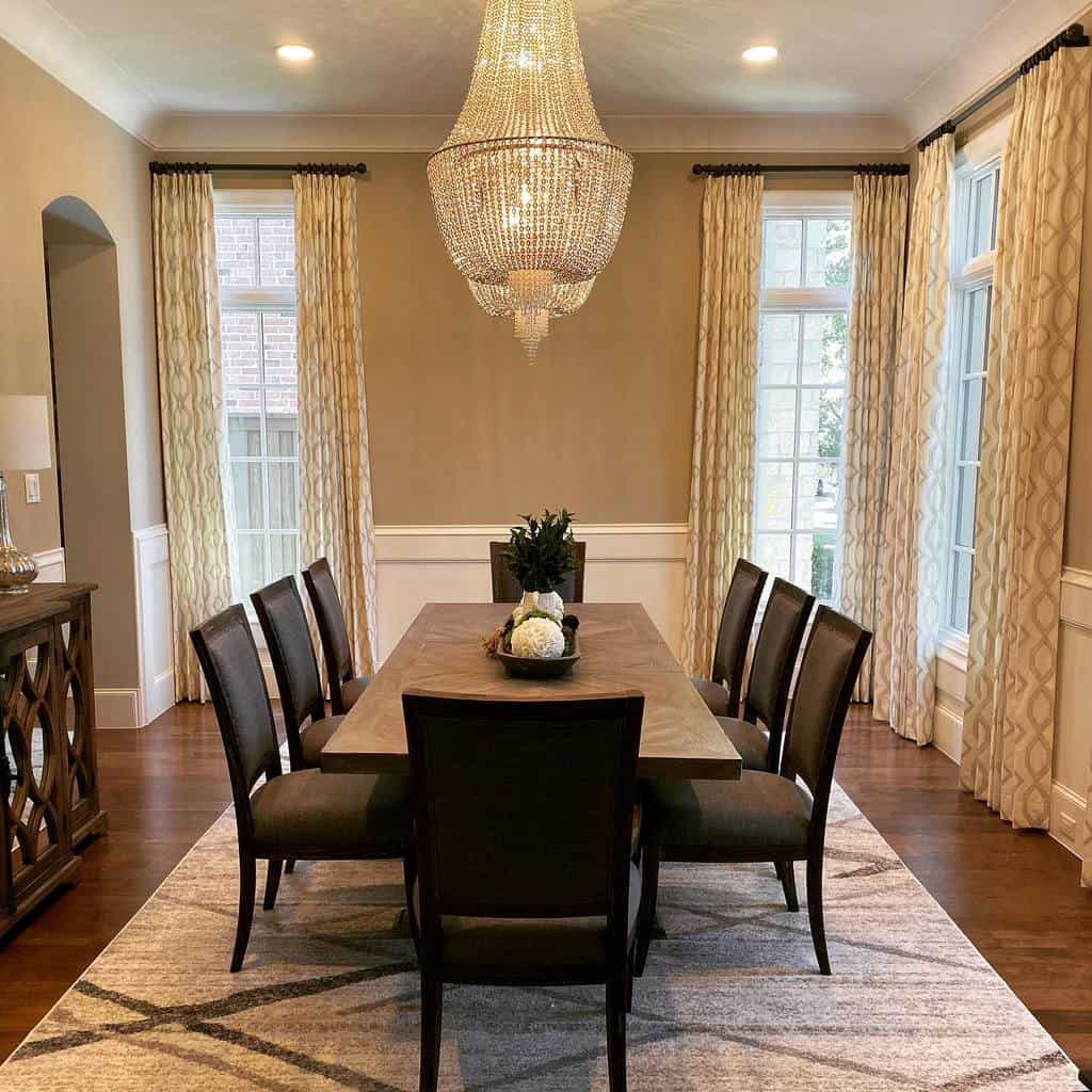 Dining room pattern curtains, long table and chairs, chandelier