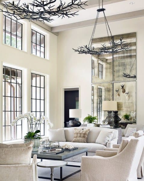 modern living room with white sofas and high ceilings