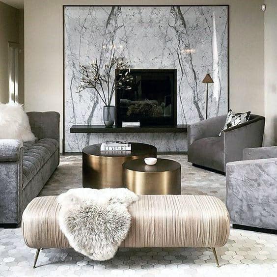 modern living room with gray sofas and ottoman 