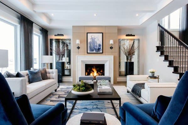 modern living room with blue and white sofas and fireplace 