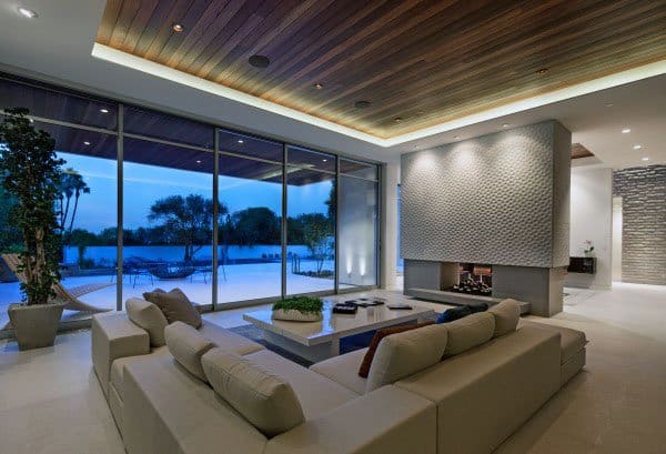 modern living room furniture, white sofa, fireplace 