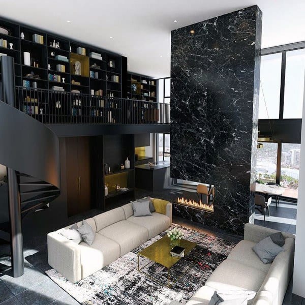 Luxurious living room with marble fireplace and upstairs library 